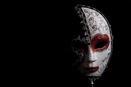 venetian carnival mask on black background