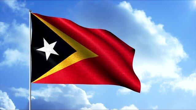 The flag of East Timor. Motion. Tricolor flag consisting of two triangles and a star on a red background