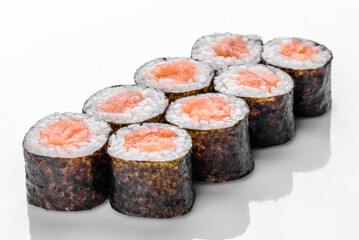 Traditional delicious fresh sushi roll set on a white background