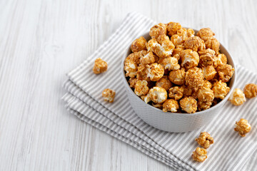 Homemade Caramel Popcorn in a gray Bowl, low angle view. Space for text.