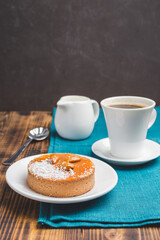 Cake with coffee and cream.
