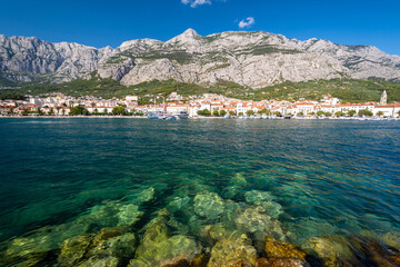 Obraz premium view on Makarska town and Biokovo mountains from adriatic sea in Dalmatia region in Croatia