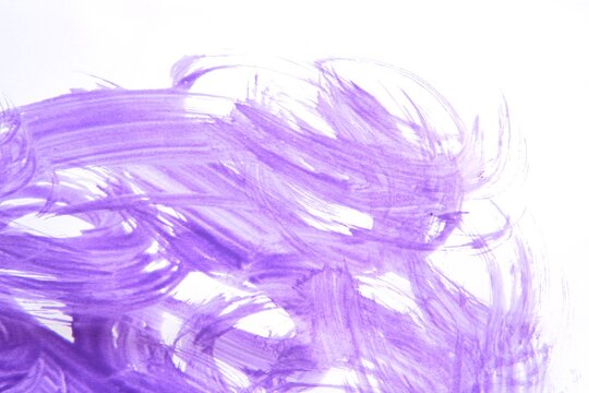 Details of purple ink on paper