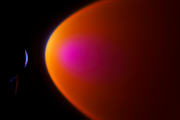 Abstract gradient light in dark, spotlighting orange background