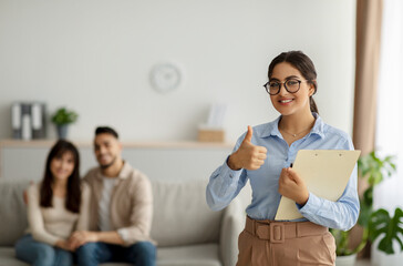 Successful therapy. Happy arab psychologist showing thumb up gesture during session with loving...
