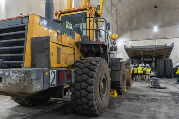 The loader is serviced at the industrial garage.