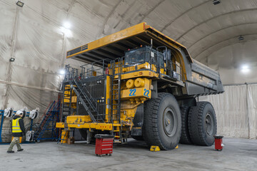 The quarry dump truck in the garage for repairs.