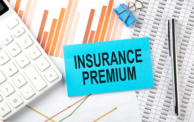 INSURANCE PREMIUM text on sticker on diagram background