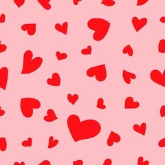 Seamless pattern with little red hearts. Pink background. Happy Valentine's Day. Love and romance. Holiday decoration. Template for greeting card, wallpaper, textile, wrapping paper, scrapbooking