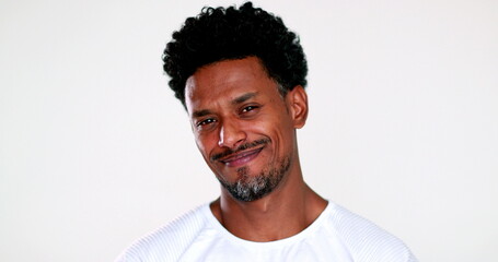 Casual black guy smiling to camera