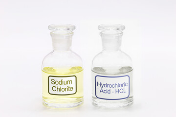 bottle of sodium chlorite next to activator Hydrochloric acid HCL, purifying chemicals and powerful...