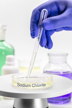 sodium chlorite being analyzed in the laboratory inside the petri dish. Chemical compound for industrial use