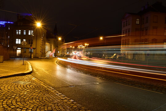 Night city landscape, traffic passing through the street, long exposure