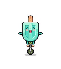 The cute popsicles character is riding a circus bike
