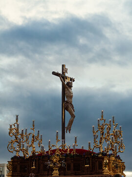 sculpture of jesus christ crucified in the easter procession in granada,sevilla,andalucia,spain. holy week in sevilla and granada. Vertical photography with copy space