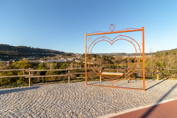 Heart symbol at the ecopista viewpoint in the city of São Pedro do Sul, Viseu, Portugal - obrazy, fototapety, plakaty
