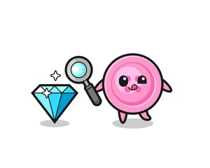 clothing button mascot is checking the authenticity of a diamond