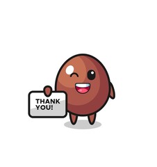 the mascot of the chocolate egg holding a banner that says thank you