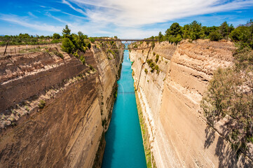 view of Corinth Canal, Isthmus of Corinth, waterway between giant rock walls - Peloponnese, Greece