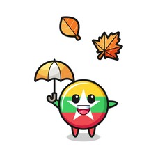 cartoon of the cute myanmar flag holding an umbrella in autumn