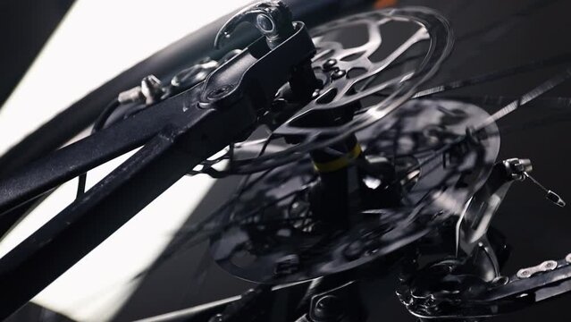 Close up on bicycle disk brake rotor.