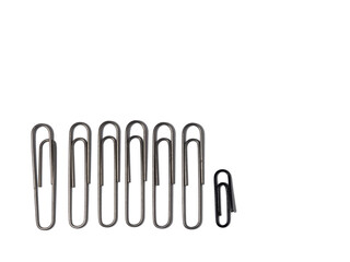 Large paper clips on a white background. Office supplies isolate. Paper fastening. Paper clips.