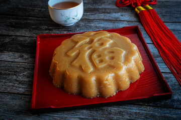 Chinese New Year Sweet Rice Cake Dessert Known as Nian Gao With Chinese Character Fortune Imprinted on it.