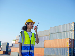 Foreman engineer female supervisor south africa black skin brazilian hold telephone work job career report logistic import export terminal cargo commercial trade container shipment transport industry