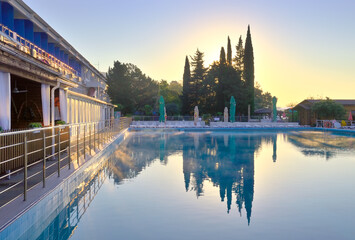 Outdoor swimming pool at dawn