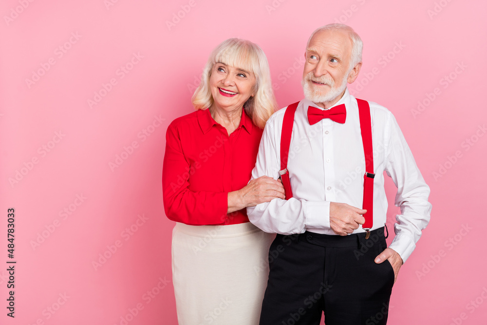 Wall mural Photo of pensioner retired man lady walk occasion empty space wear stylish suspenders isolated pastel color background