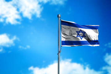 Flag of Israel on the wind against blue sky