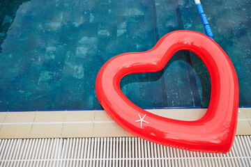 Heart tube and starfish by the pool