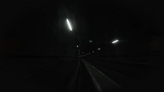 Timelapse of subway train moving in the tunnel. View from cabin