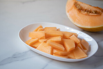 Fresh Japanese melon with orange pulp