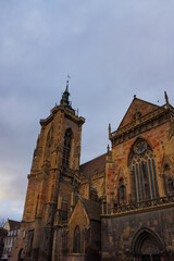 Fototapeta na wymiar Beautiful church tower of Martinsm nster cathedral in French city of colmar.