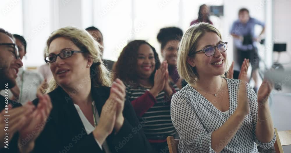 Aufkleber presentations that inspire passion. diverse group of business people smiling and clapping with a sta