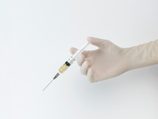 hand with syringe