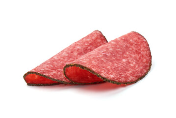 Salami sausage slices, isolated on white background.