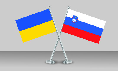Crossed flags of Ukraine and Slovenia. Official colors. Correct proportion. Banner design
