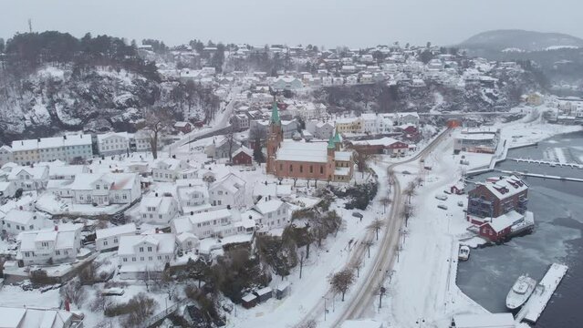 Winter Scene At Kragero City In Norway - aerial drone shot