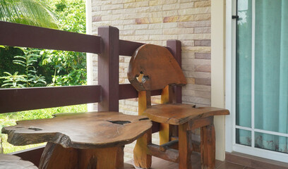 Wooden chair and table made from rootage on the terrace