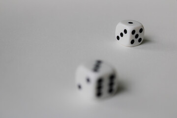 white dice on black background