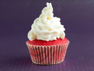 velvet cupcake with white frosting