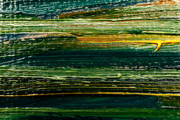 Green, yellow and black oil paints