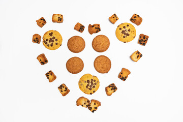 Homemade cookies with chocolate, nuts and coffee beans isolated on a white background 