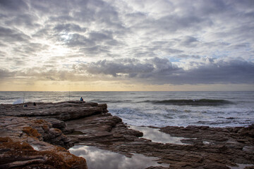 Seascape view with rocks and waves of Uvongu in Margate, the South Coast of South Africa