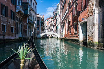 Boat sailing on a canal in Venice