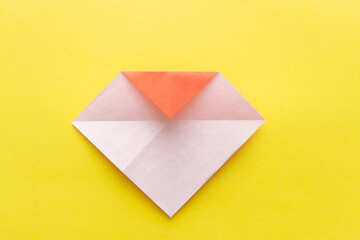 Step by step instructions how to make origami easy heart.