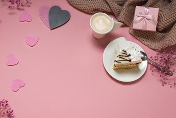 Flat lay of valentine's day, cake and coffee mug, with copy space on pink background
