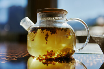 glass teapot with tea close-up cafe drink